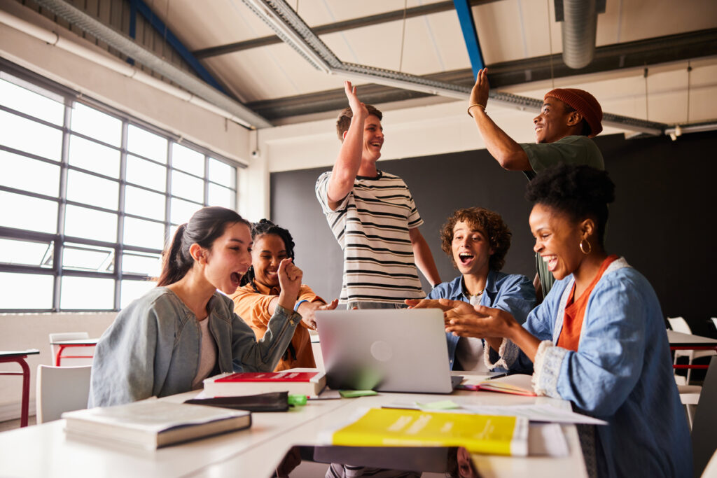 higher ed students celebrating data governance pillars